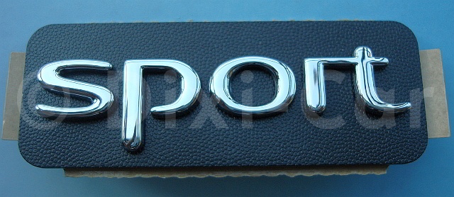 Napis "Sport" na drzwi przednie Astra II przed 2000